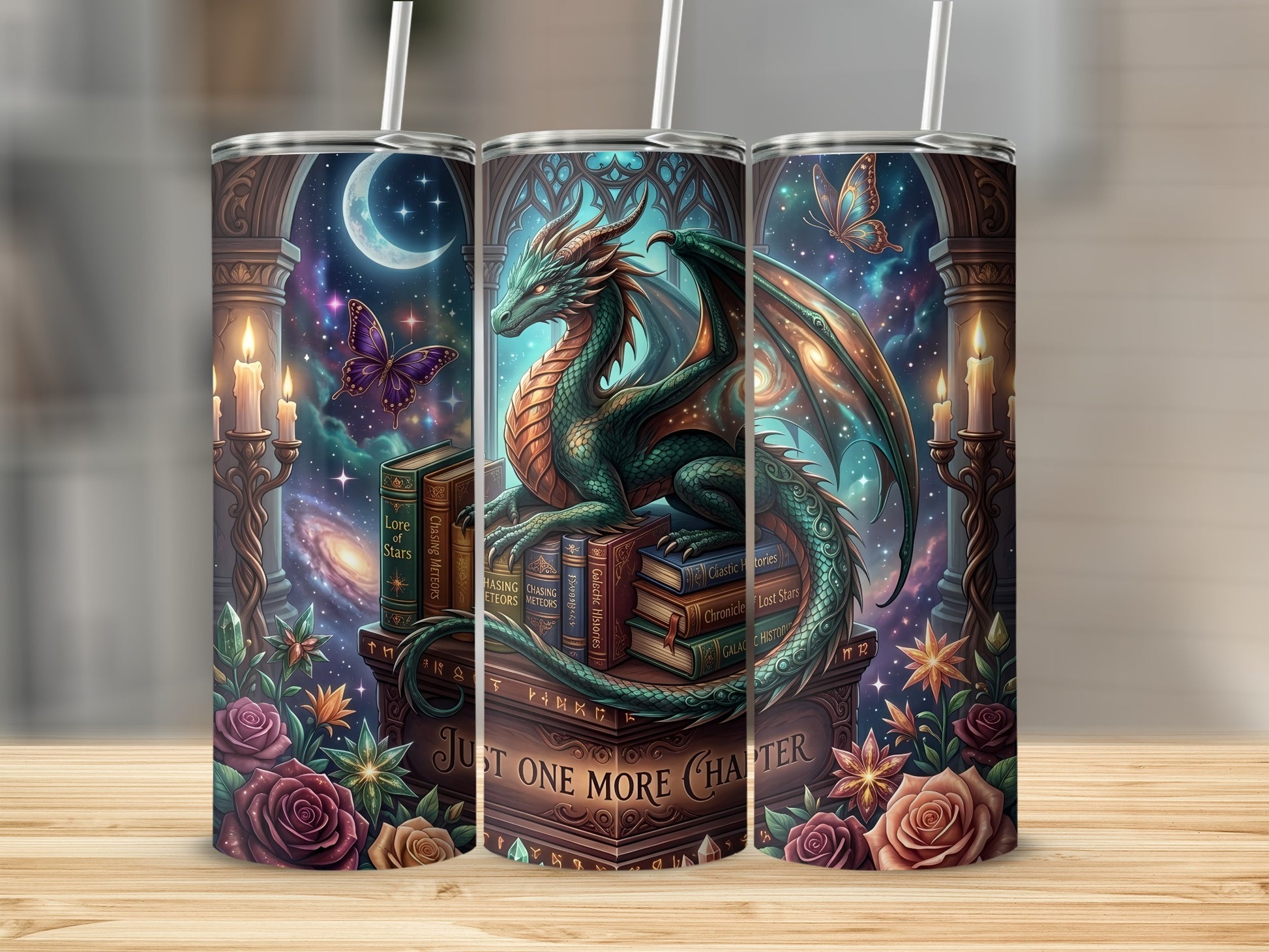 Green dragon on stack of books with "Just One More Chapter" text and celestial motifs.