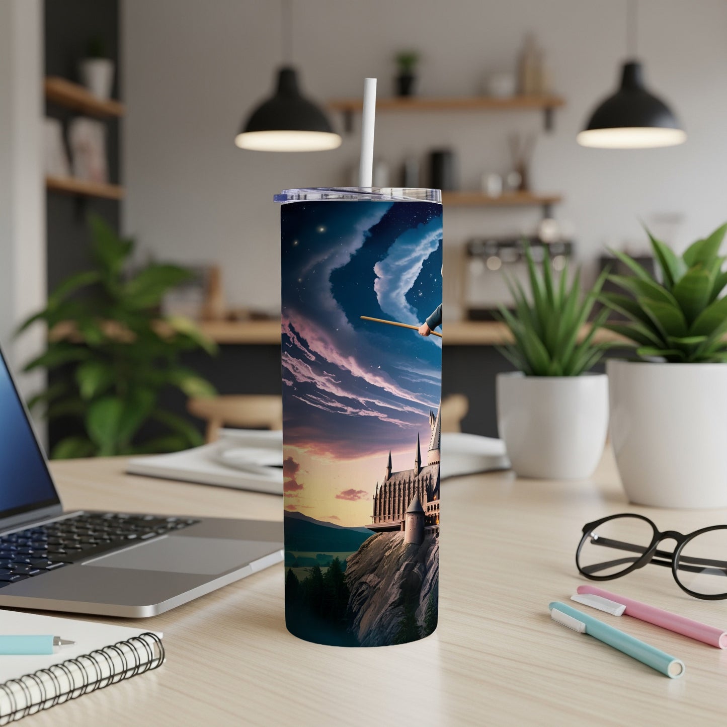 Hogwarts castle under a starry night sky on a Harry Potter themed tumbler.