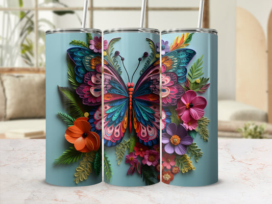 Three skinny tumblers decorated with colorful butterflies and floral designs.