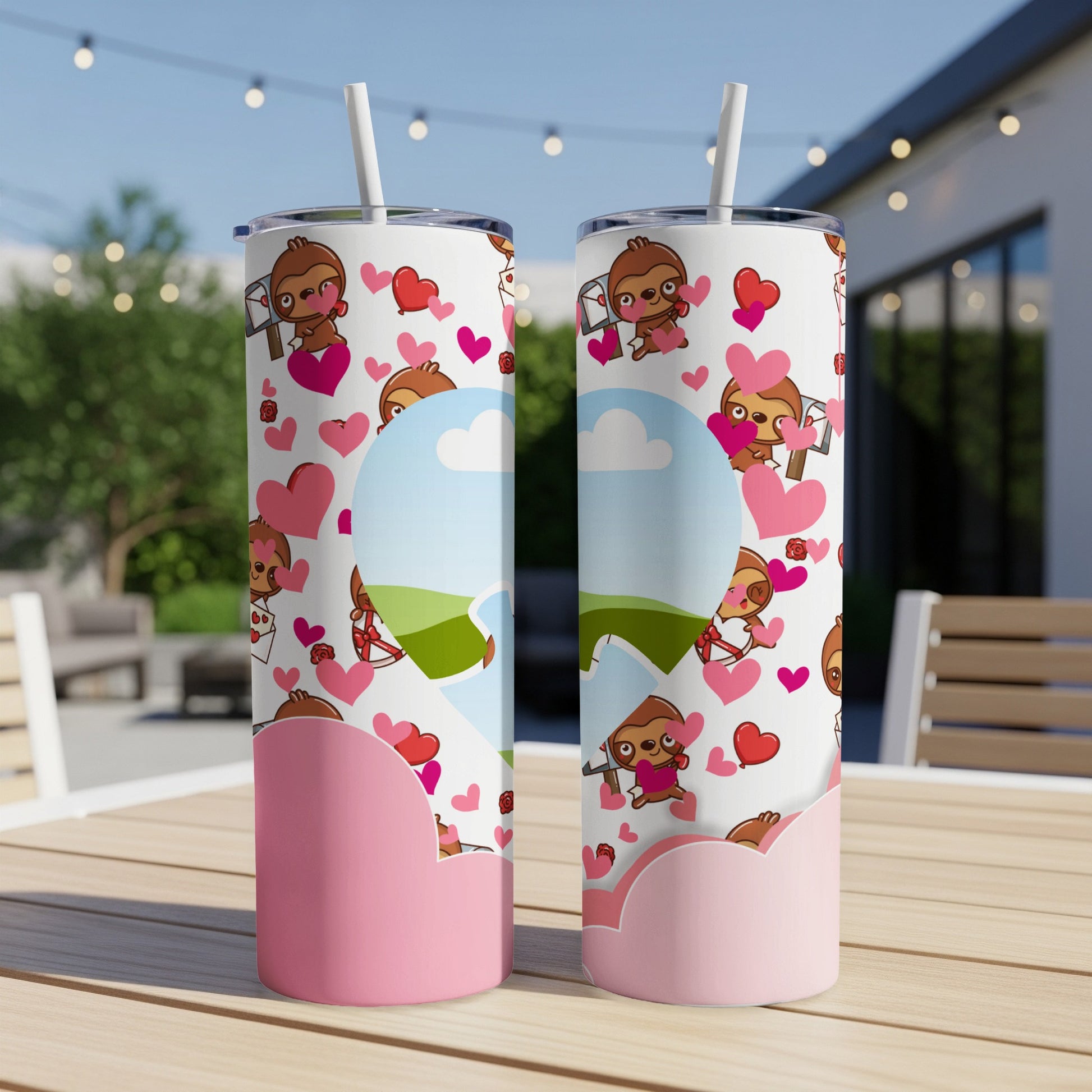 Two tumblers with cute sloths and hearts pattern, one with a landscape photo inside a heart.