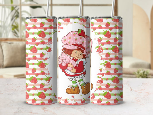 Strawberry Shortcake character holding a pink cat on a pink and green striped background.