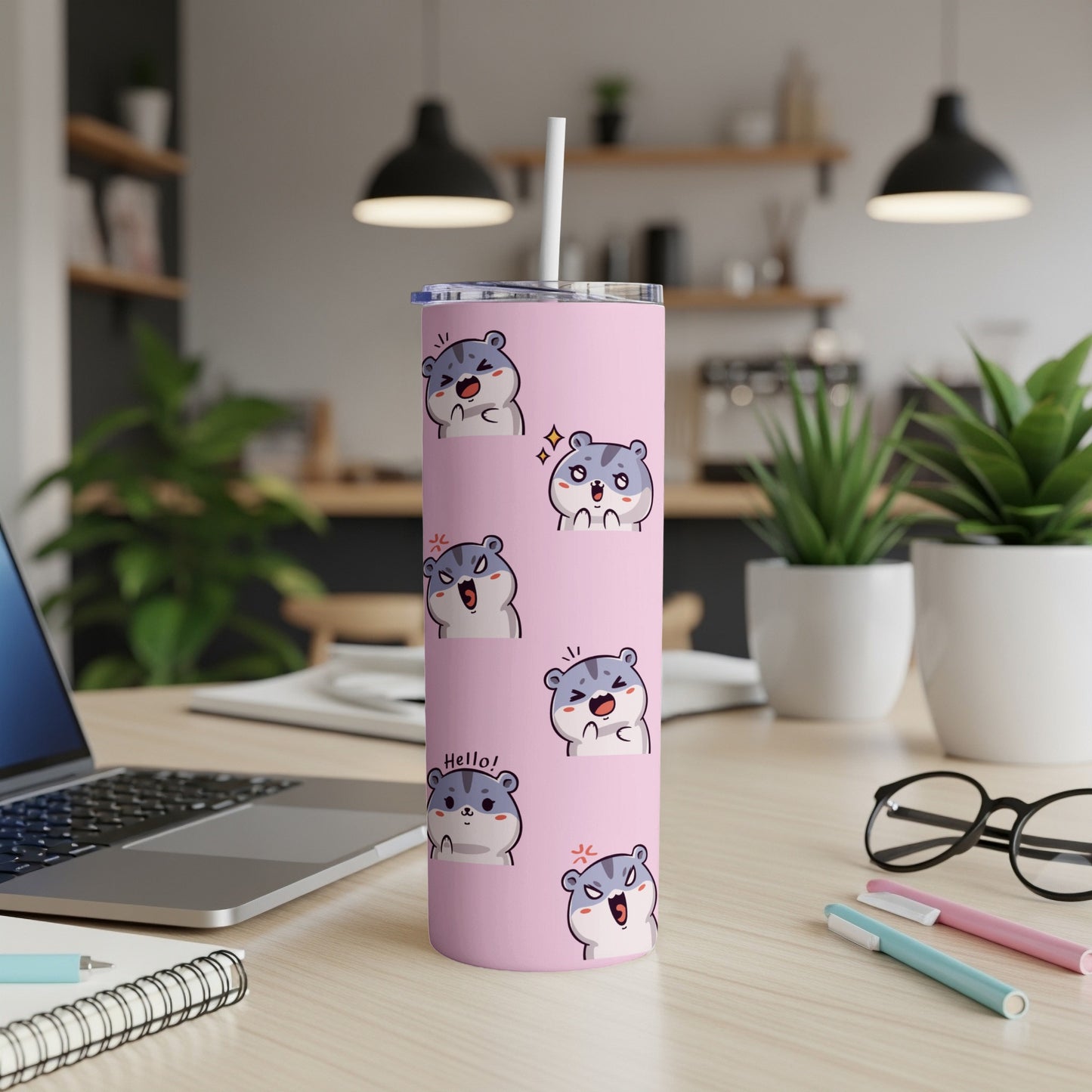 Pink tumbler with cute cartoon hamsters in various expressions.