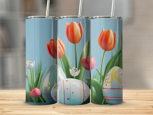 Three tumblers with tulips and decorated Easter eggs on a wooden surface.