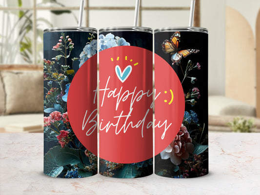 Tumbler with happy birthday text and floral butterfly design.