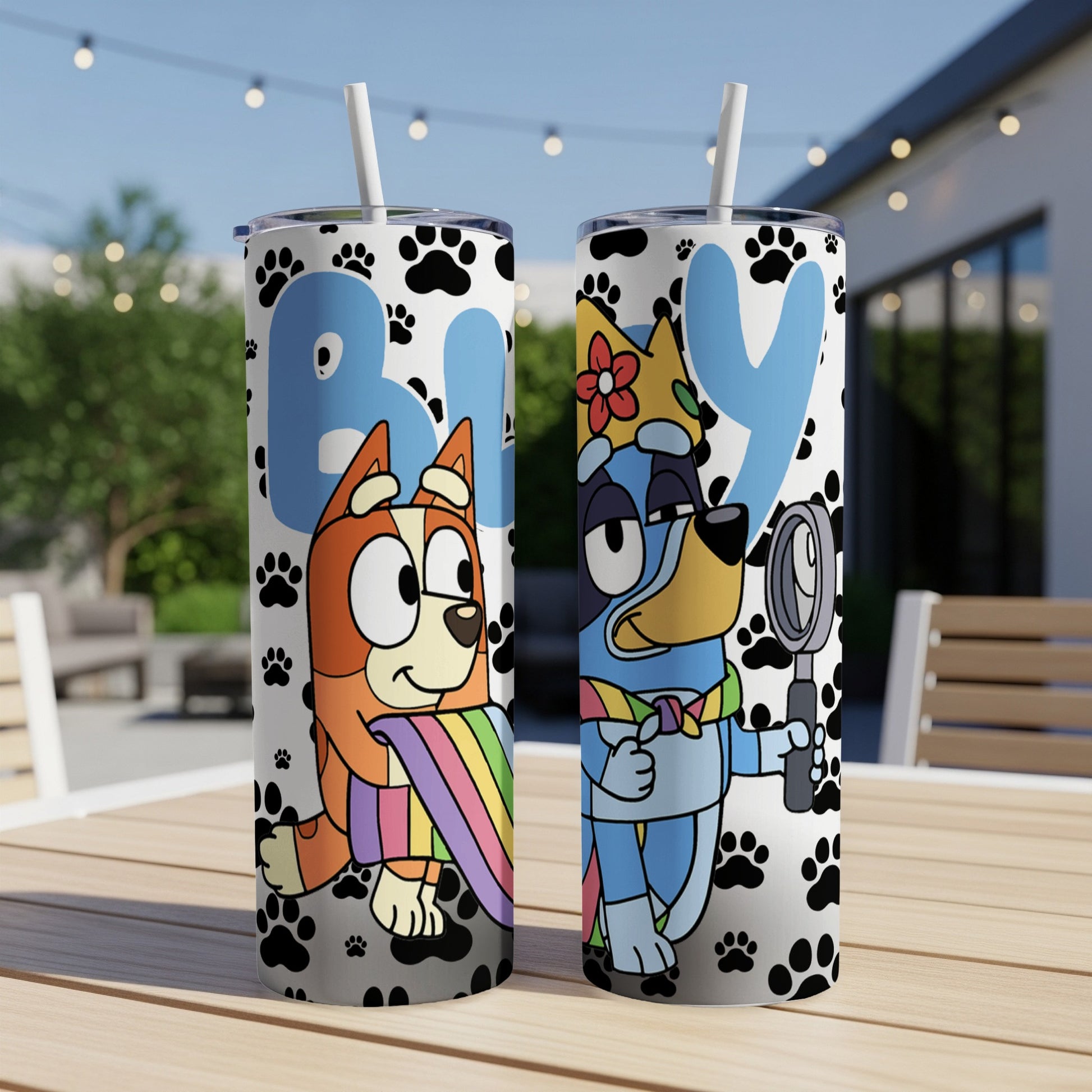 Bluey and Bingo characters on two tumblers with paw print pattern.