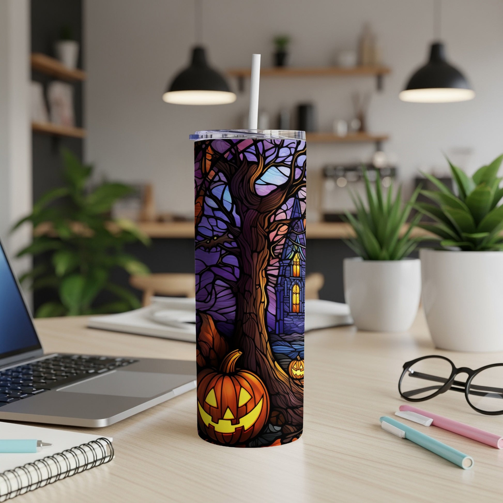 Tumbler with a spooky Halloween scene featuring a jack-o'-lantern and haunted house.