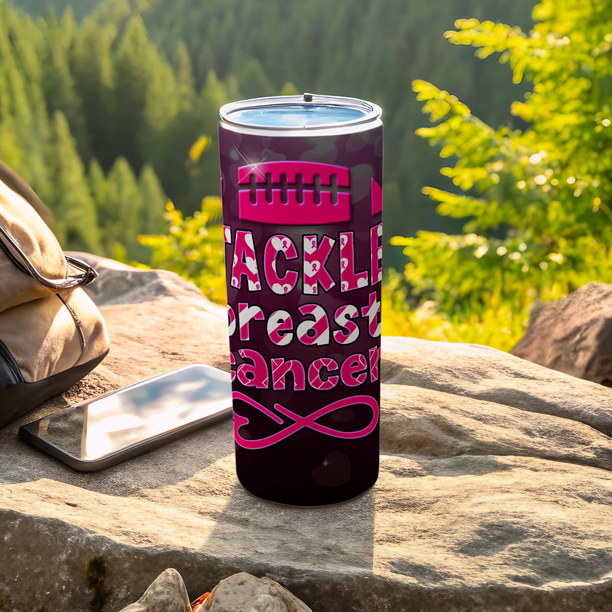 Pink tumbler with "Tackle Breast Cancer" text and ribbon graphic.