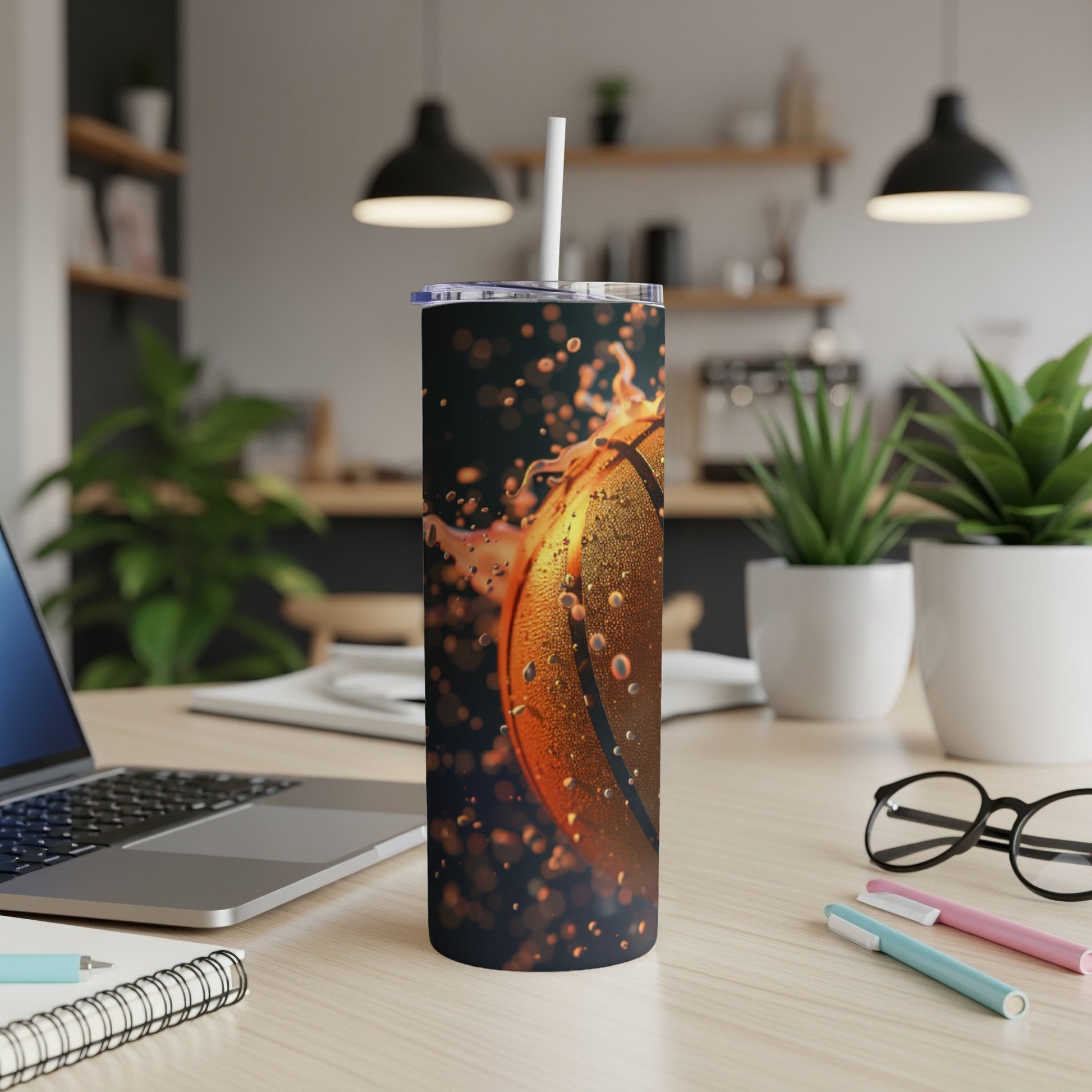 Basketball tumbler with water splashes and condensation.