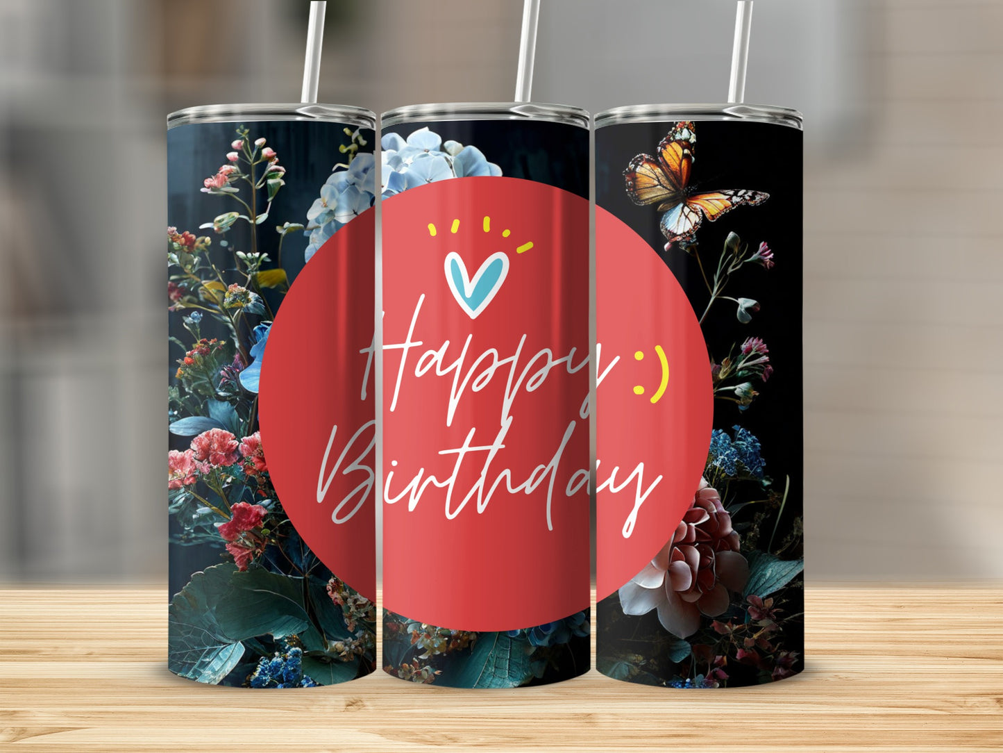 Floral tumbler with butterfly and "Happy Birthday" text.
