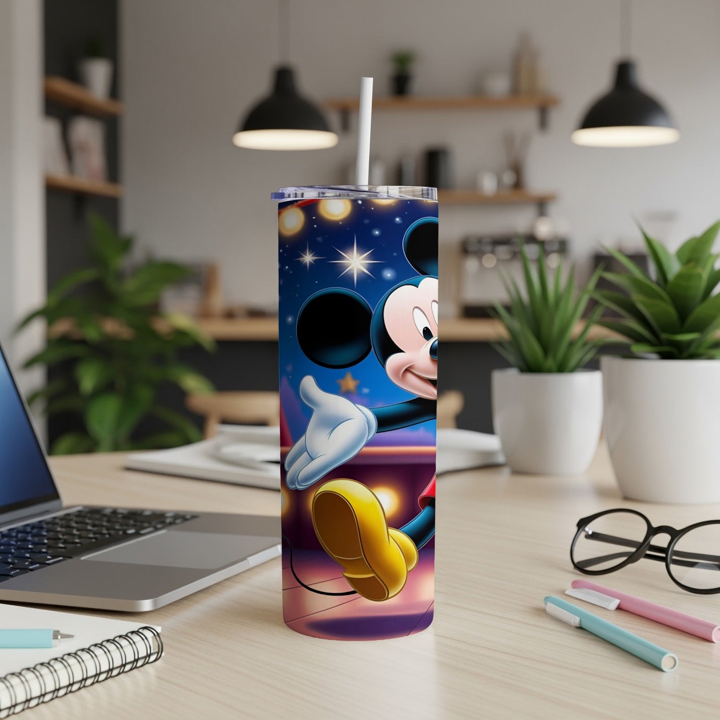 Mickey Mouse on a tumbler with a starry background.