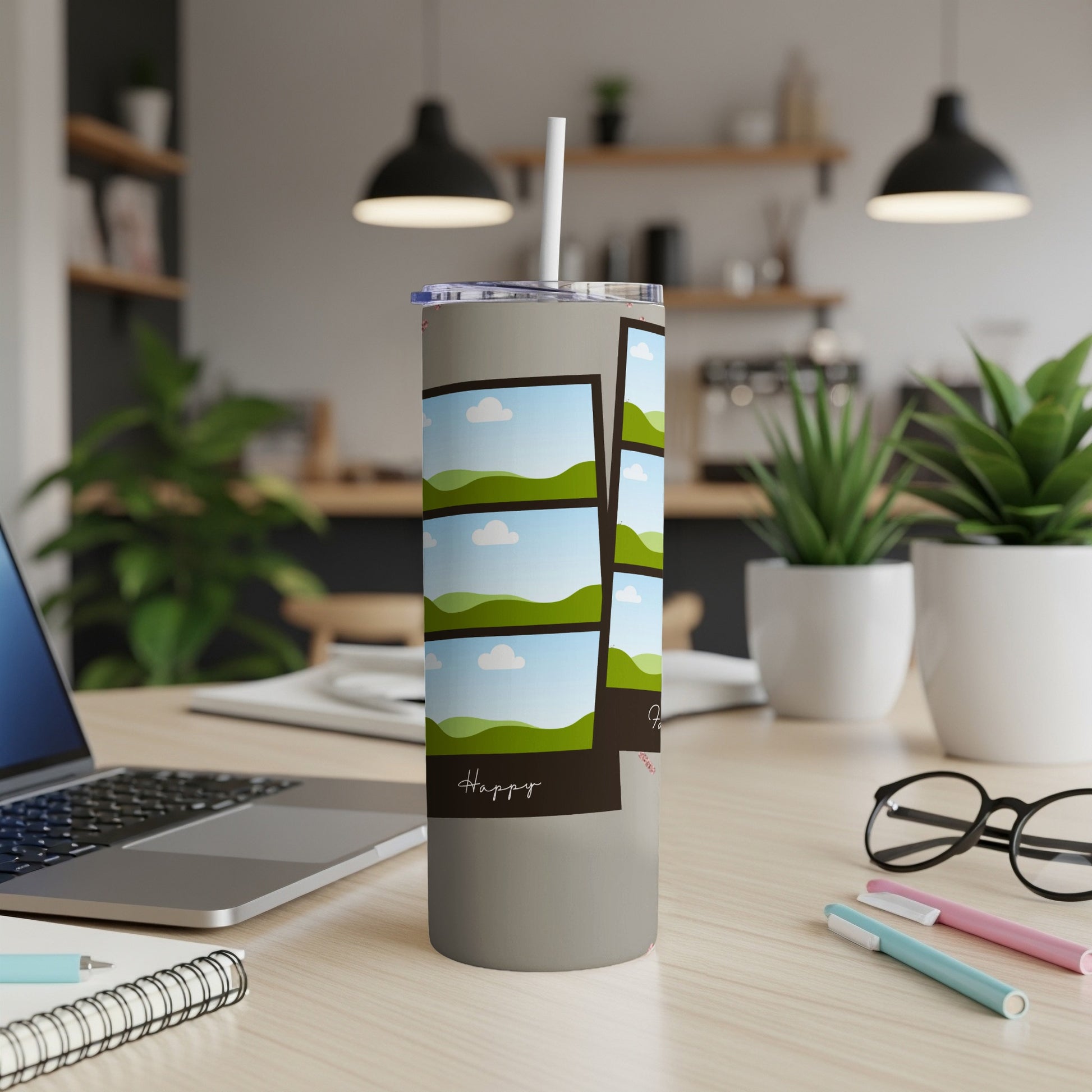 Gray tumbler with landscape photo collage and "Happy" text.