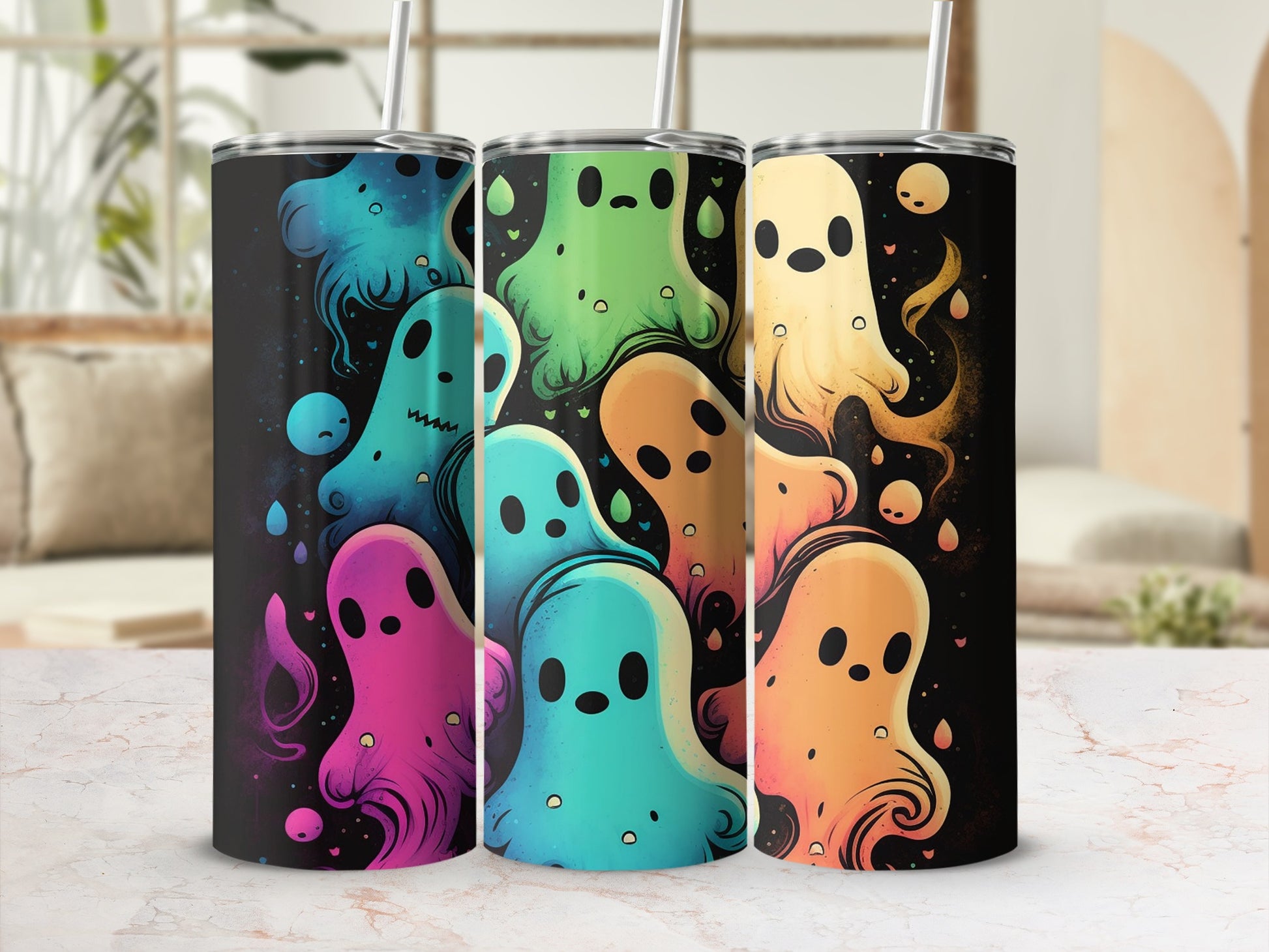 Three tumblers featuring colorful cartoon ghosts against a black, speckled background.