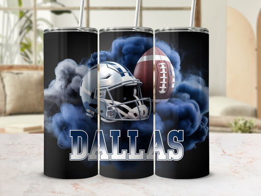 Dallas Cowboys football helmet and ball in blue smoke on tumbler.