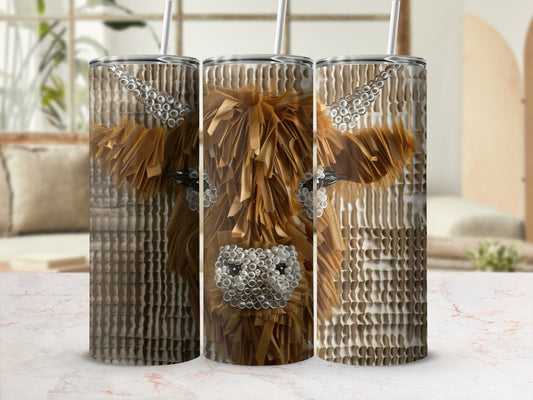 Three tumblers with highland cow faces made of textured material.