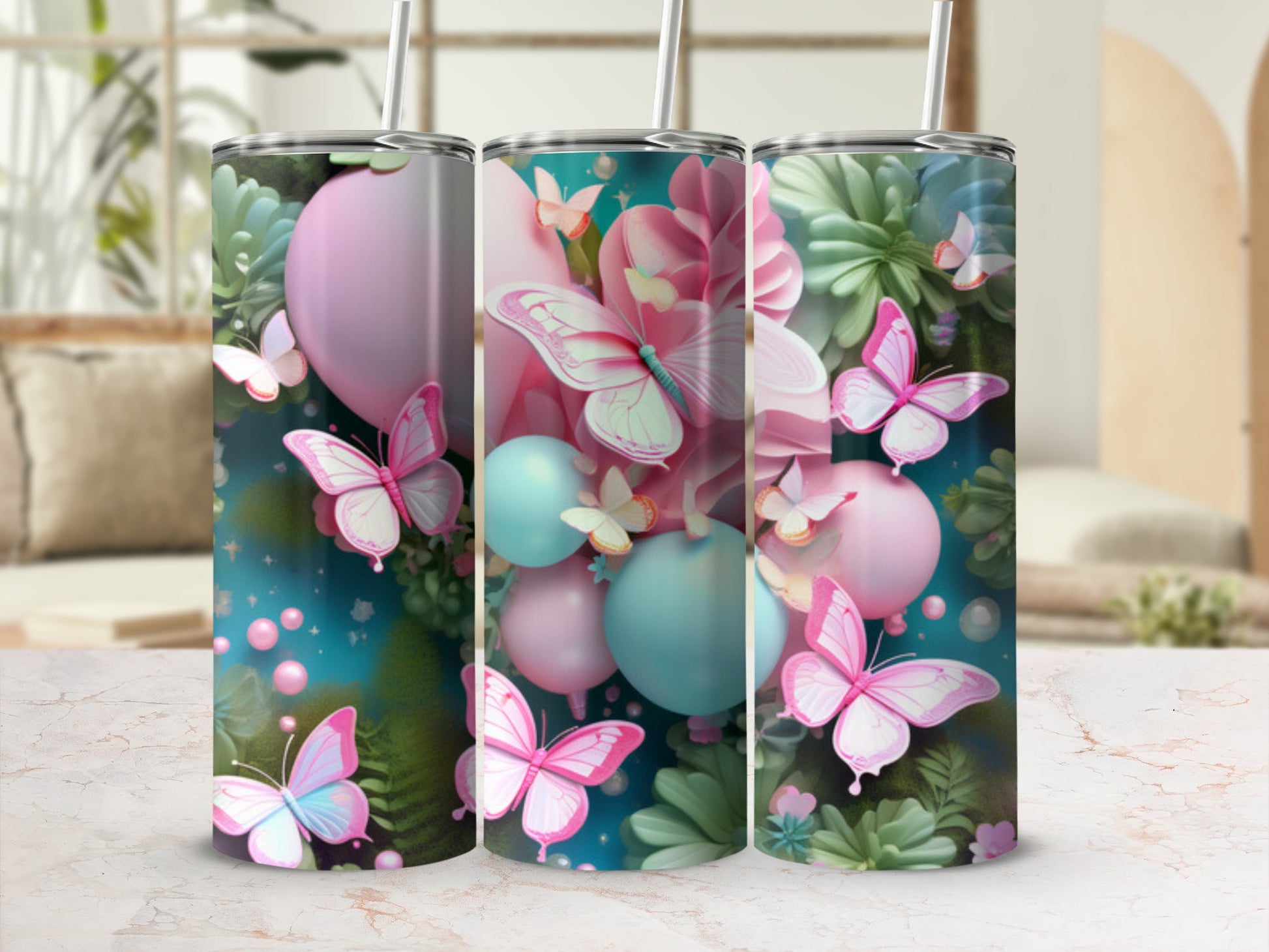 Three tumblers with butterflies and floral patterns in pink, blue, and green.