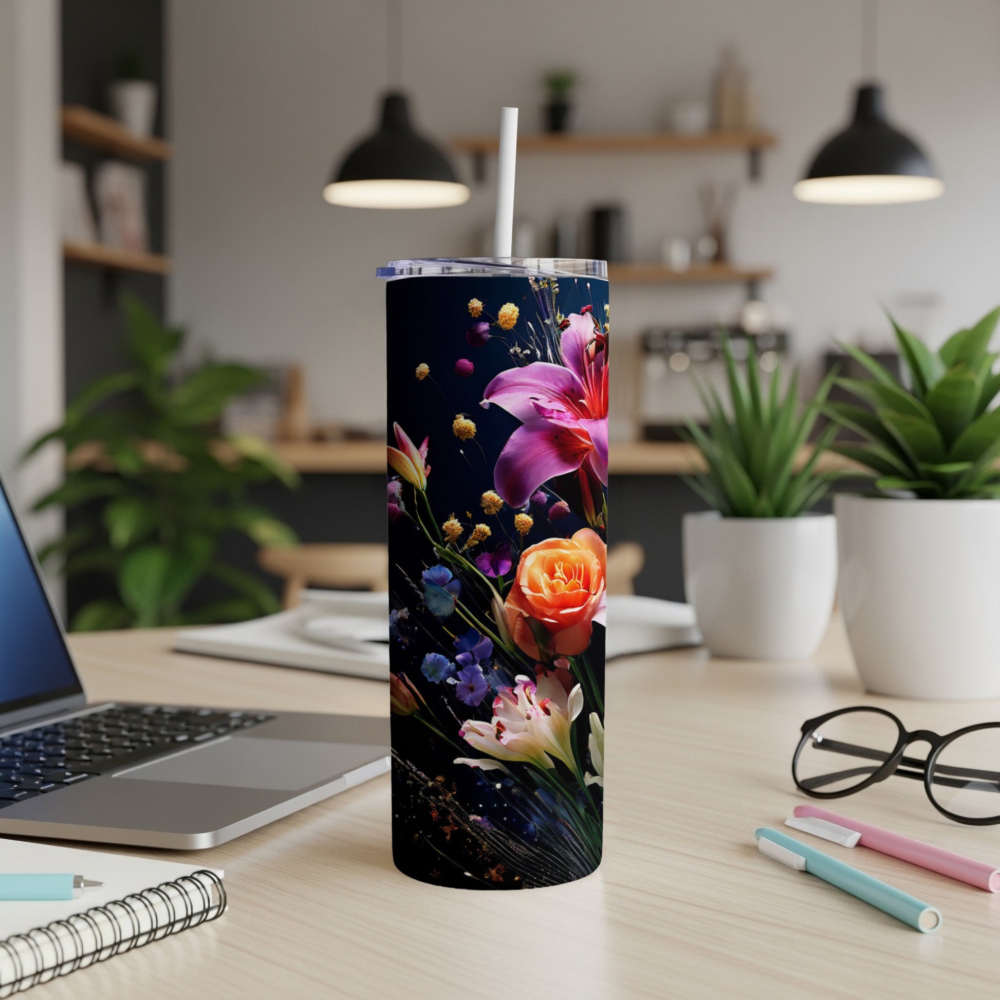 Tall tumbler with floral pattern featuring lilies, roses, and other flowers.