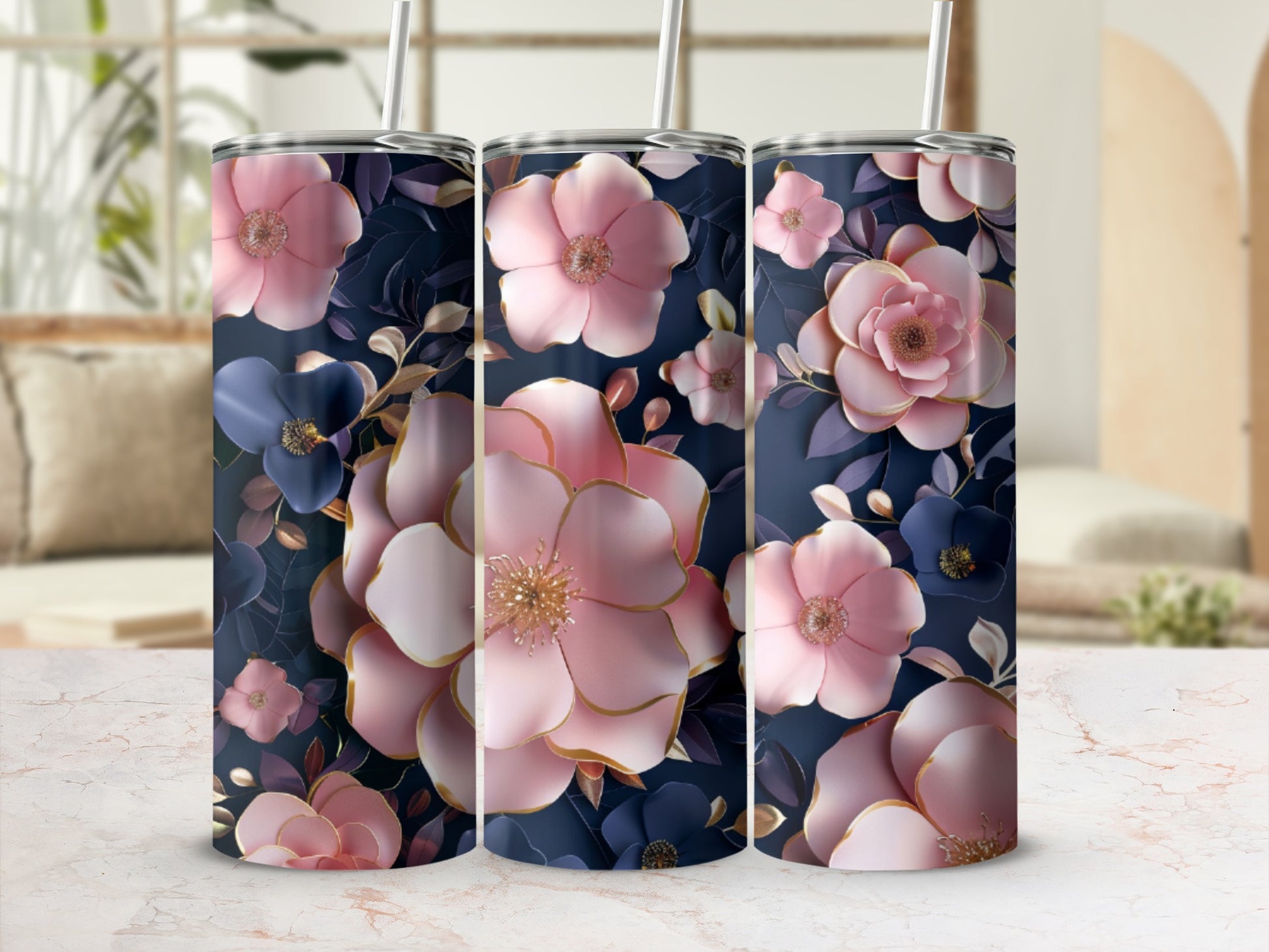 Three tumblers featuring a dark floral pattern with pink and blue flowers.