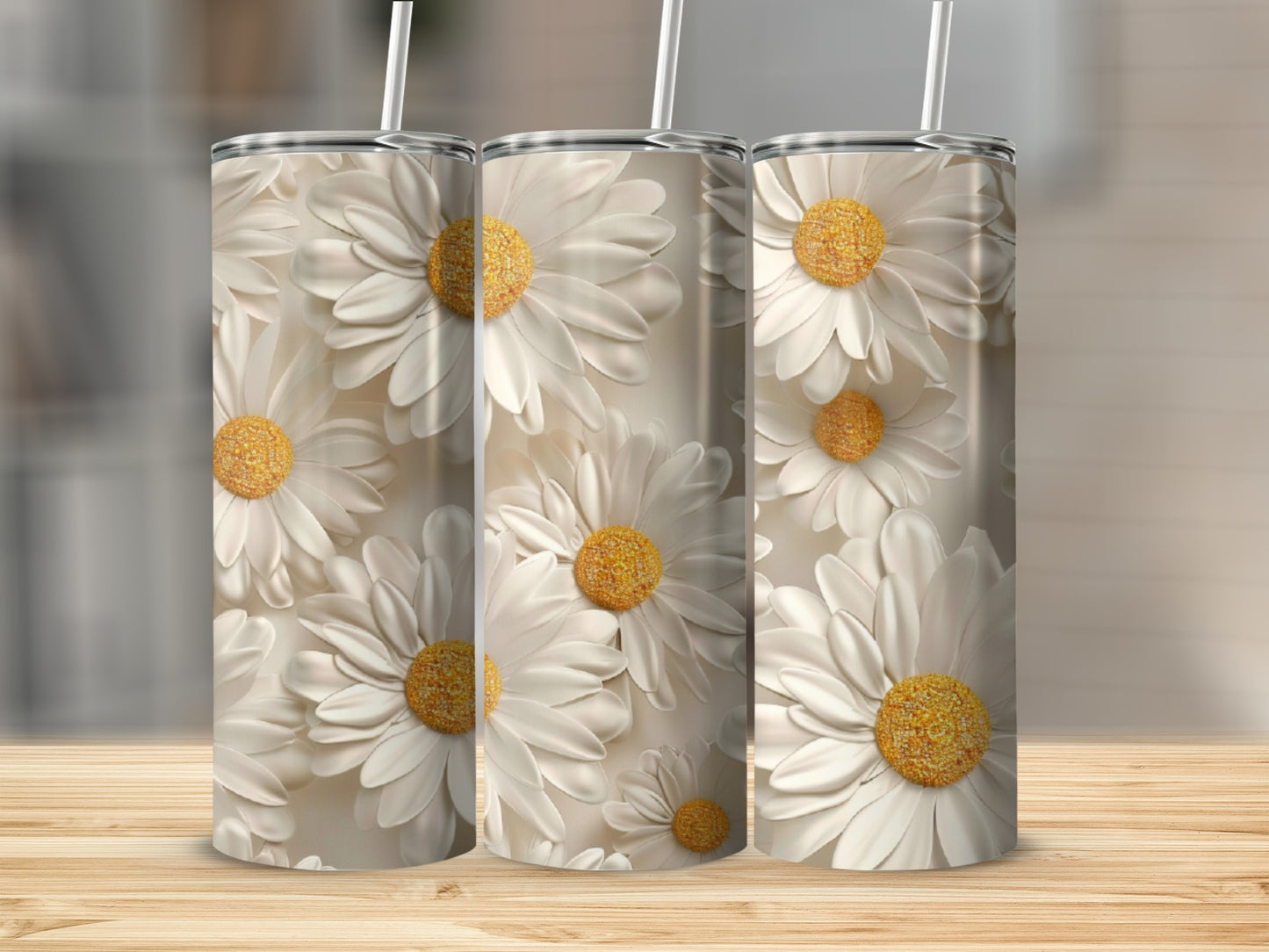 Three tumblers with a detailed daisy floral pattern.