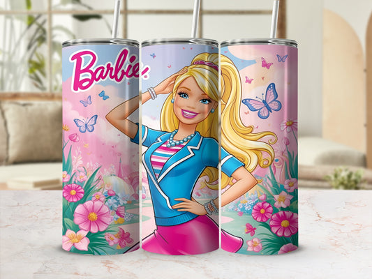 Barbie smiling, wearing a pink skirt and blue jacket, with butterflies and flowers.