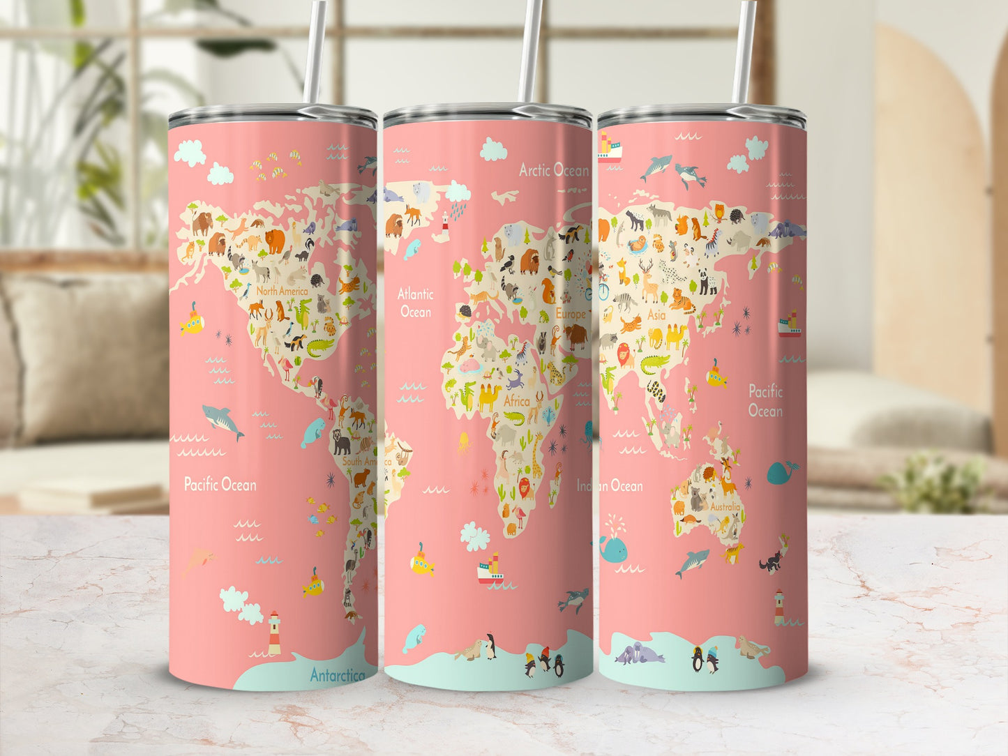 Three tumblers with a pink background featuring a colorful world map design with cartoon animals.