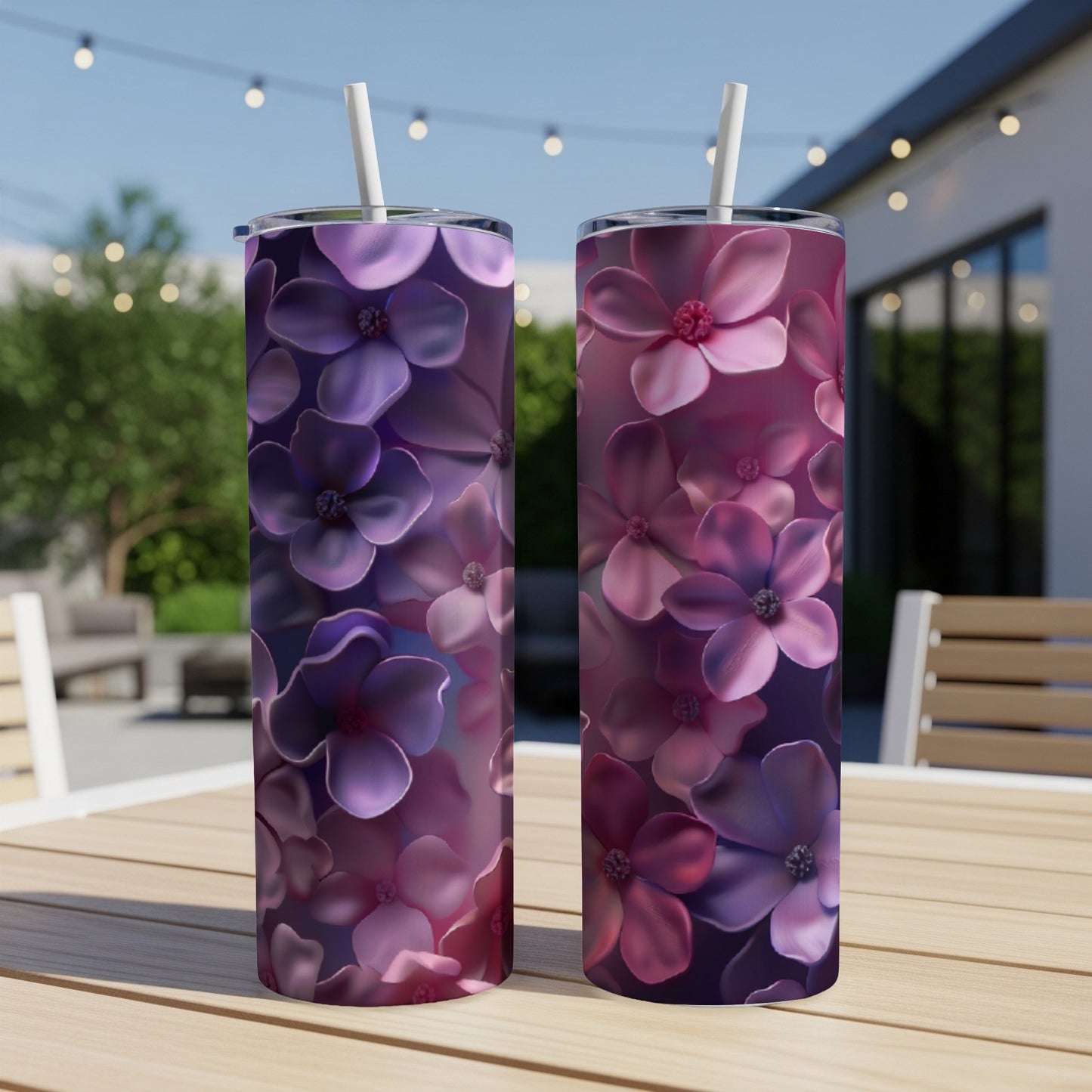 Two tumblers with a vibrant purple and pink floral pattern.
