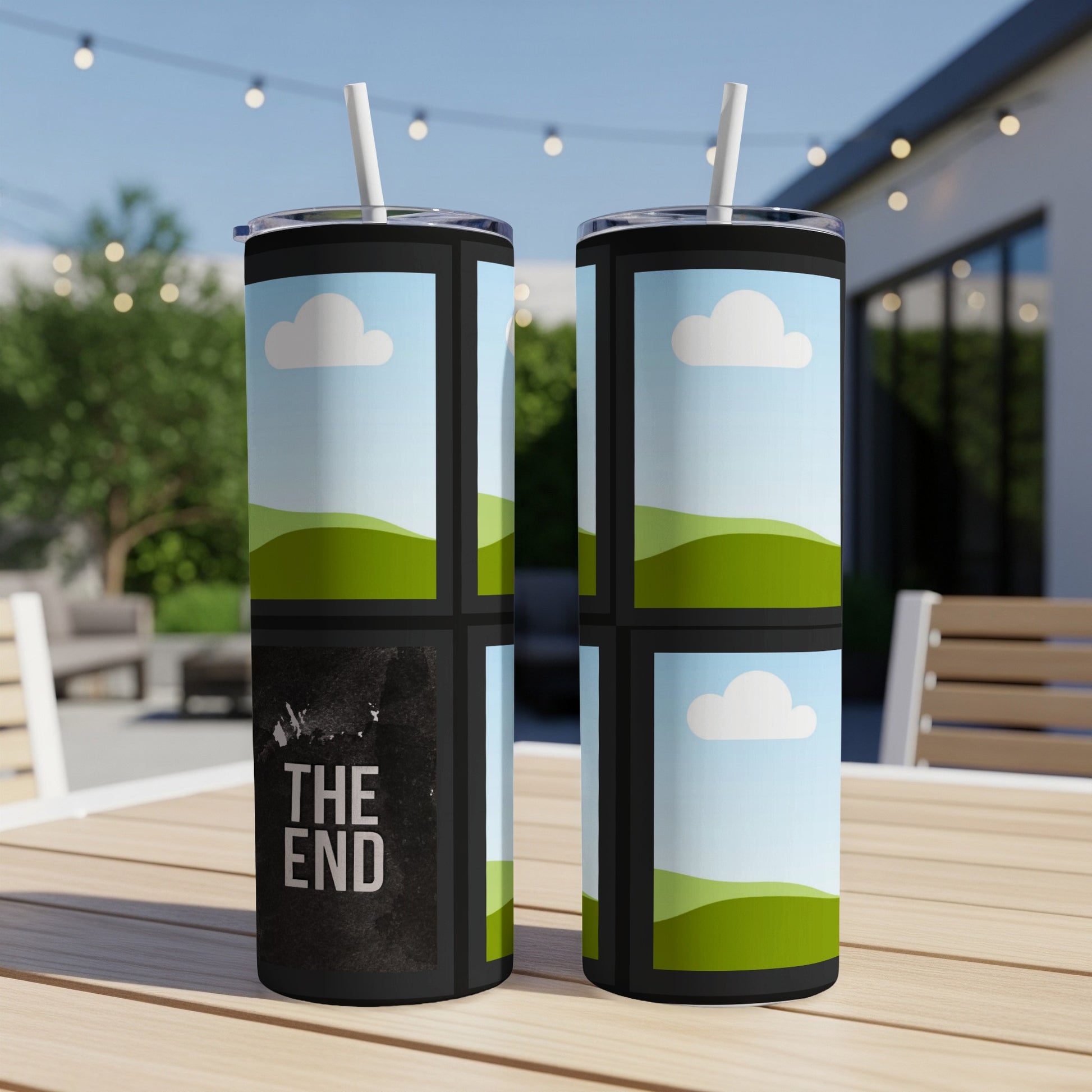 Two tumblers with a sky, clouds, and rolling green hills design. One tumbler has text.