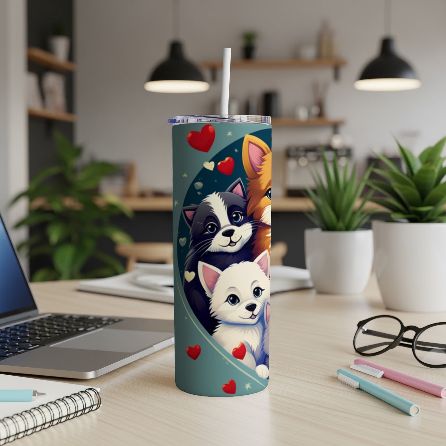Cute cartoon cats and dogs on a teal tumbler with hearts.