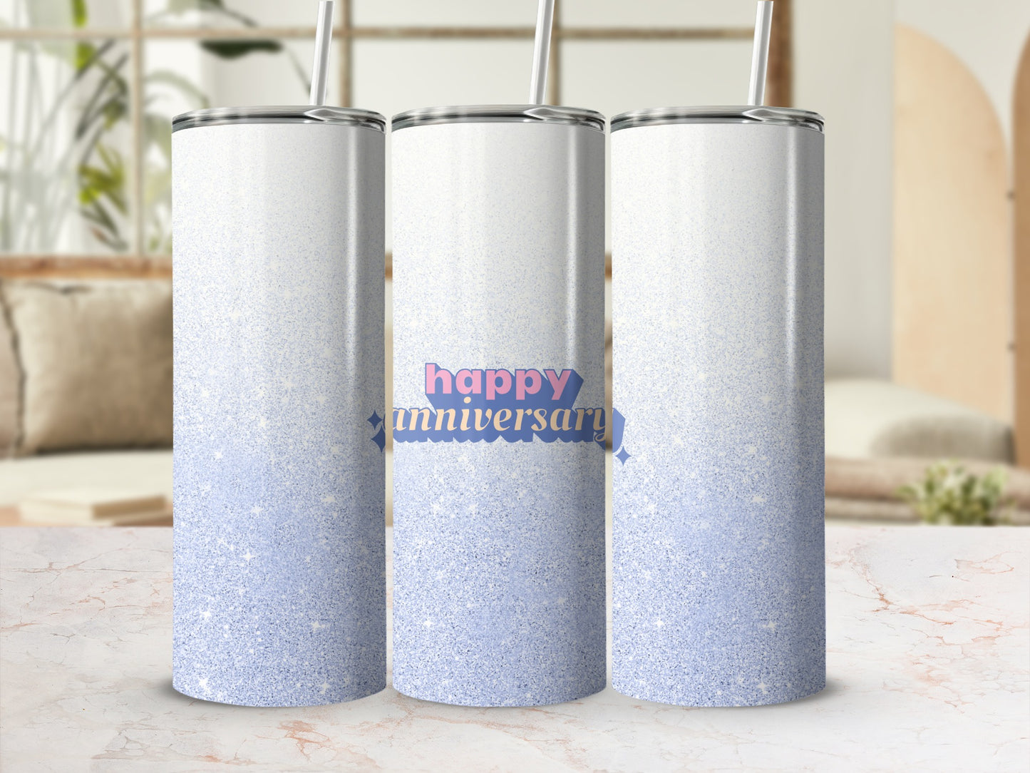 White ombre tumbler with blue glitter and "happy anniversary" text.