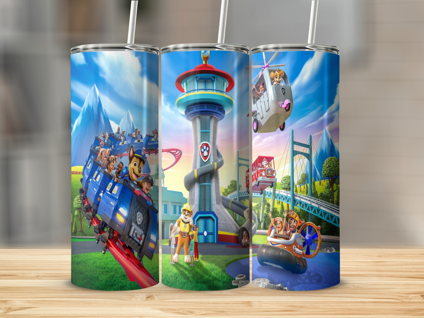 Paw Patrol characters on a blue train, tower, and raft with a bridge and mountains.