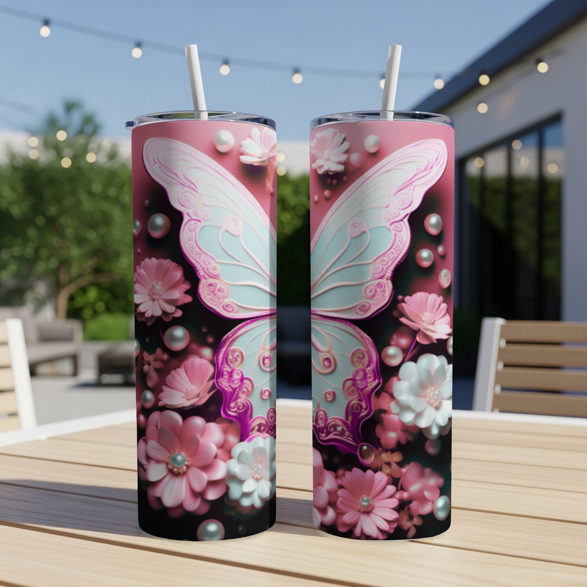 Pink tumbler with butterfly and floral design.