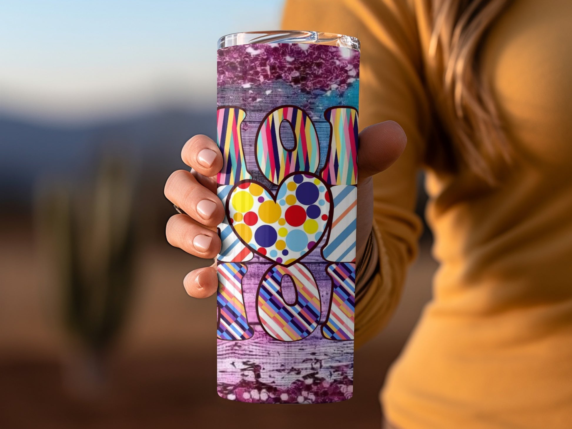 Colorful Heart Design on Vibrant Patterned Tumbler