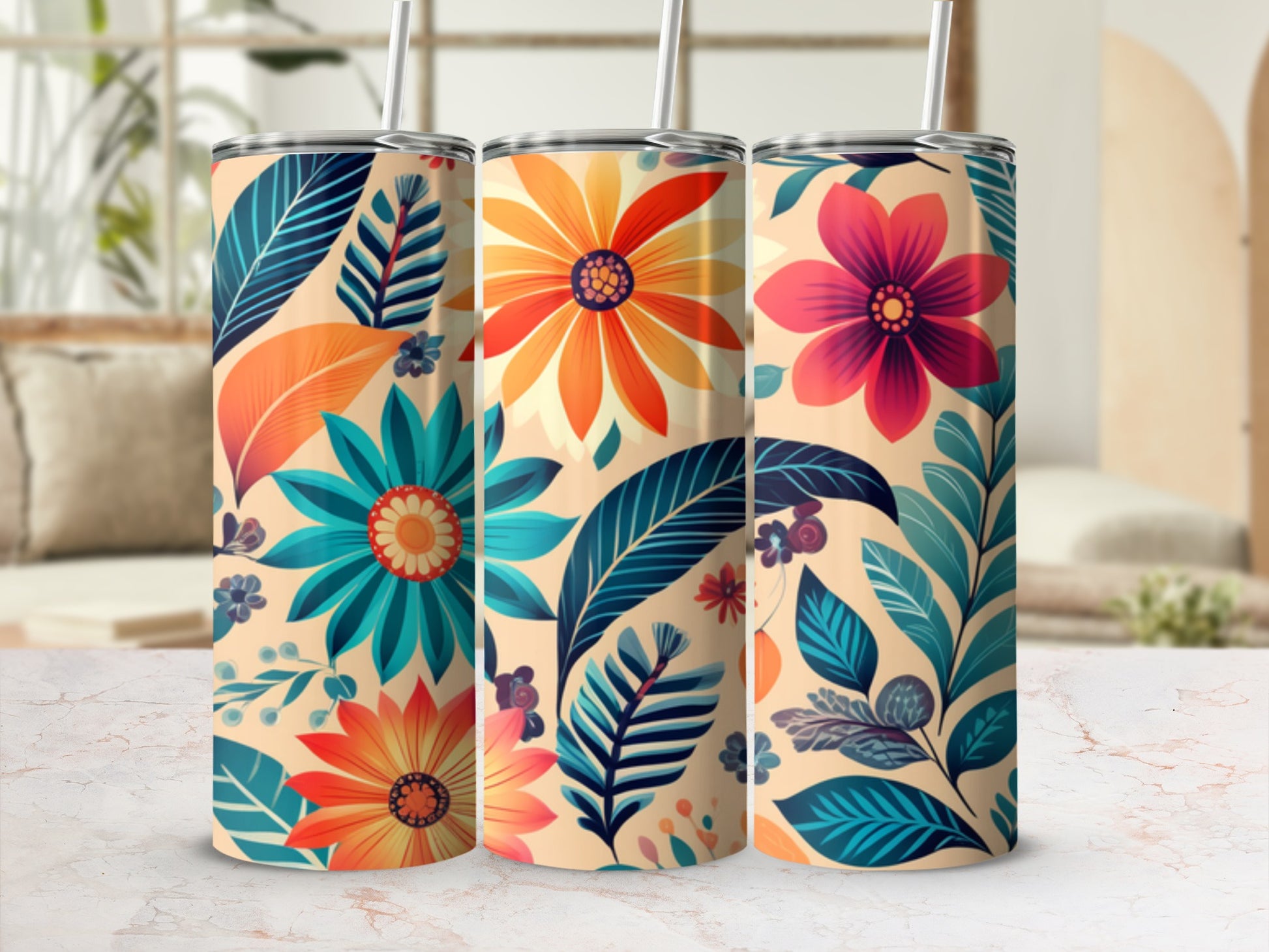 Three tumblers with a floral and leaf pattern in teal, orange, and pink.