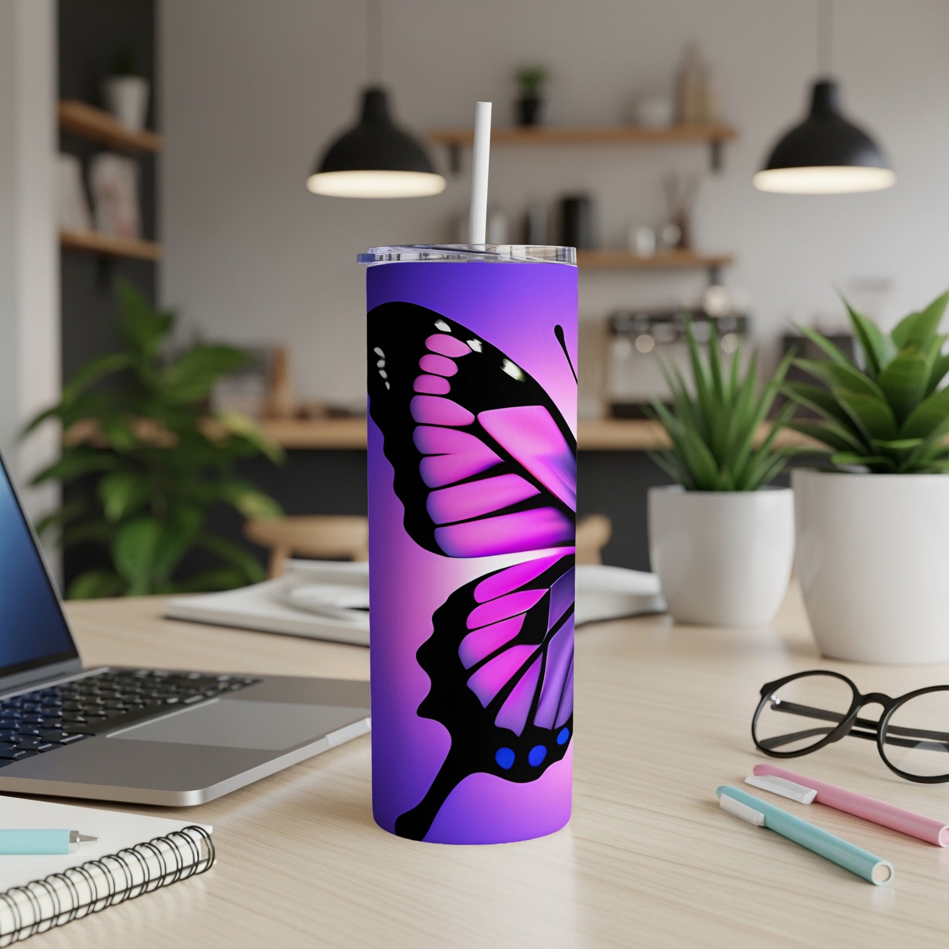 Purple tumbler with a vibrant pink butterfly design.
