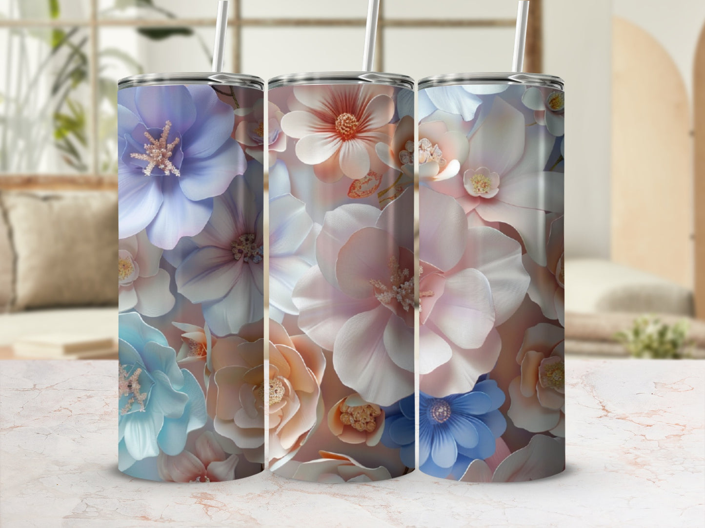 Three tumblers featuring a floral watercolor pattern with pastel colors.
