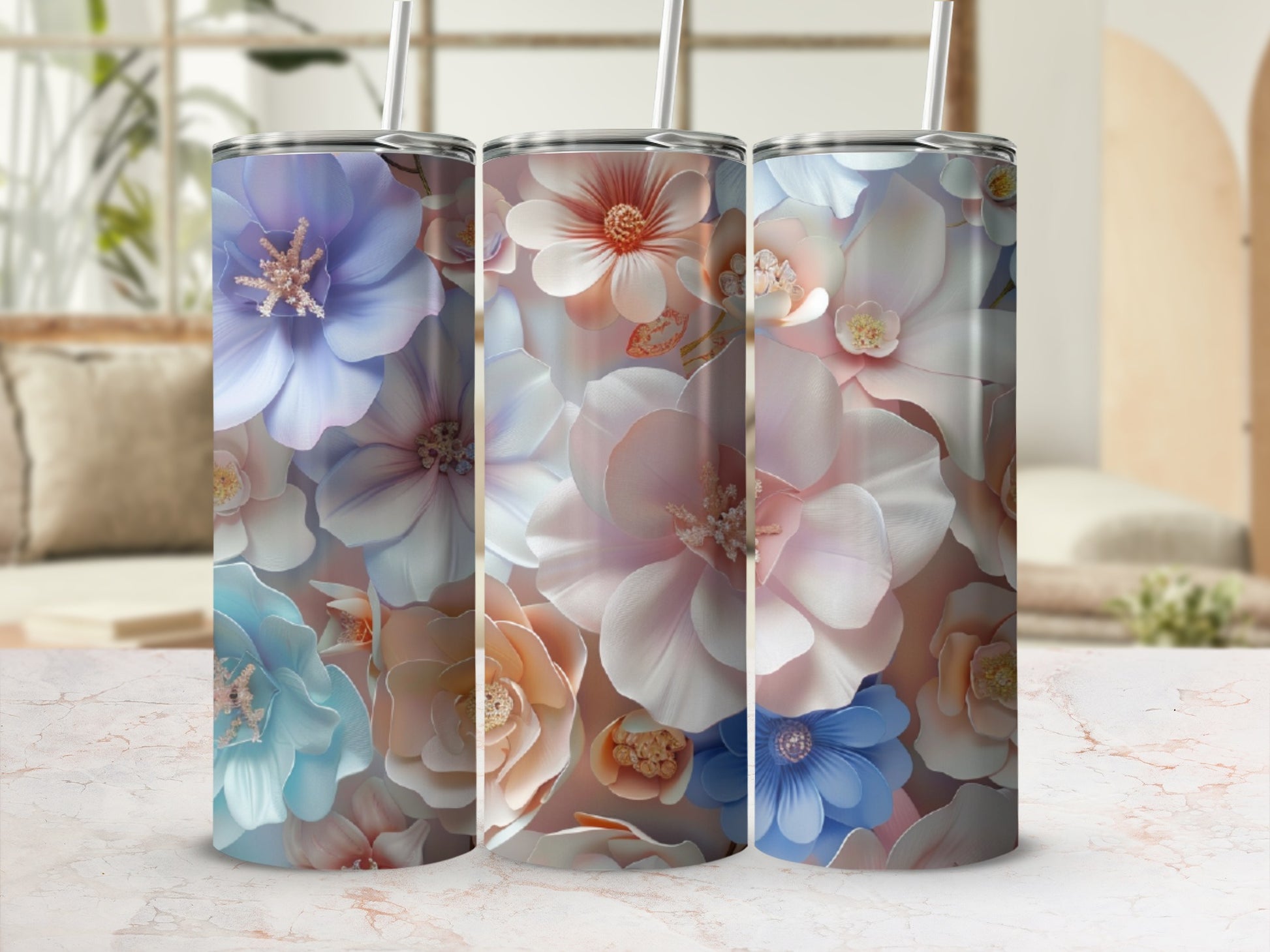 Three tumblers featuring a floral watercolor pattern with pastel colors.