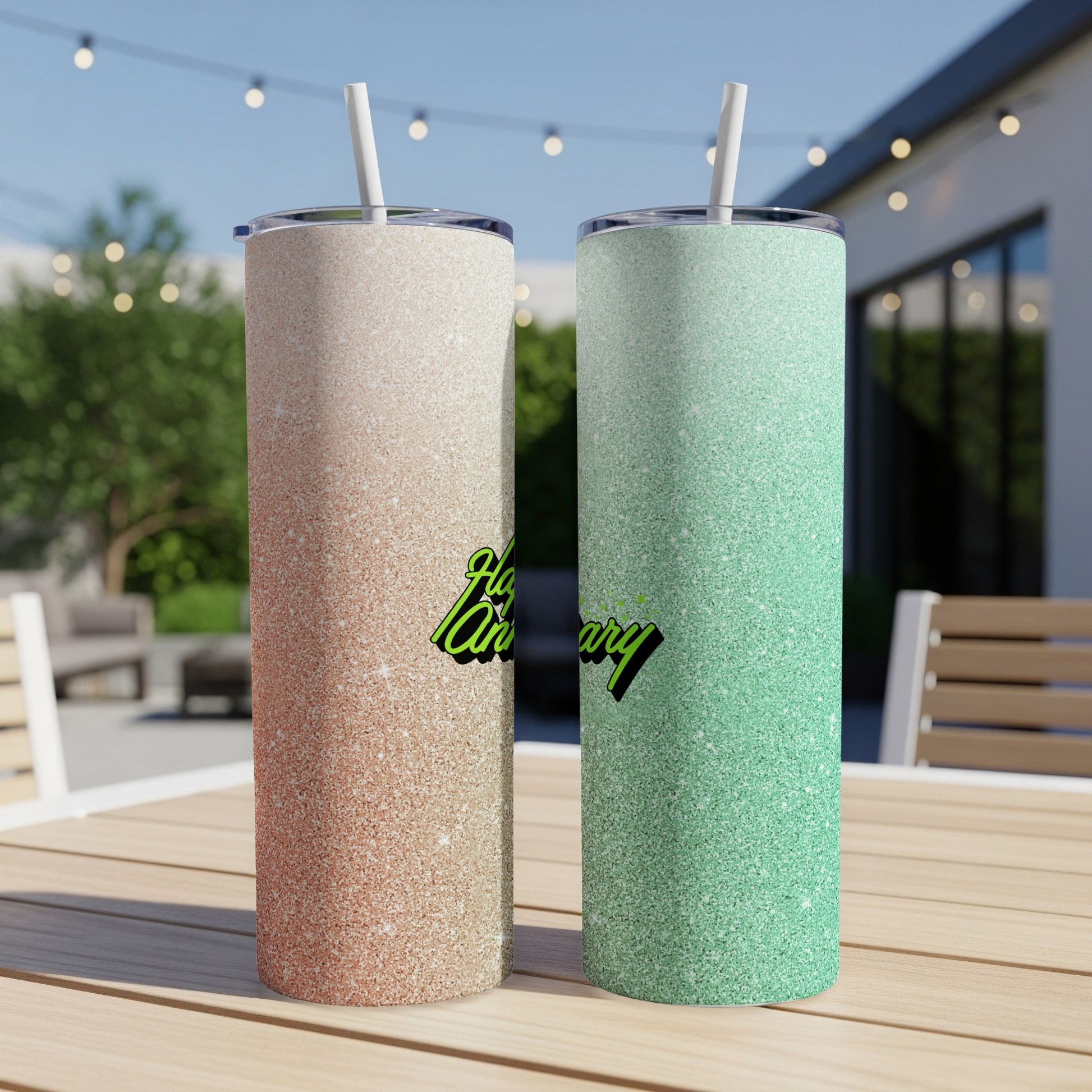 Two glitter tumblers, one rose gold, one mint green, with "Happy Anniversary" text.