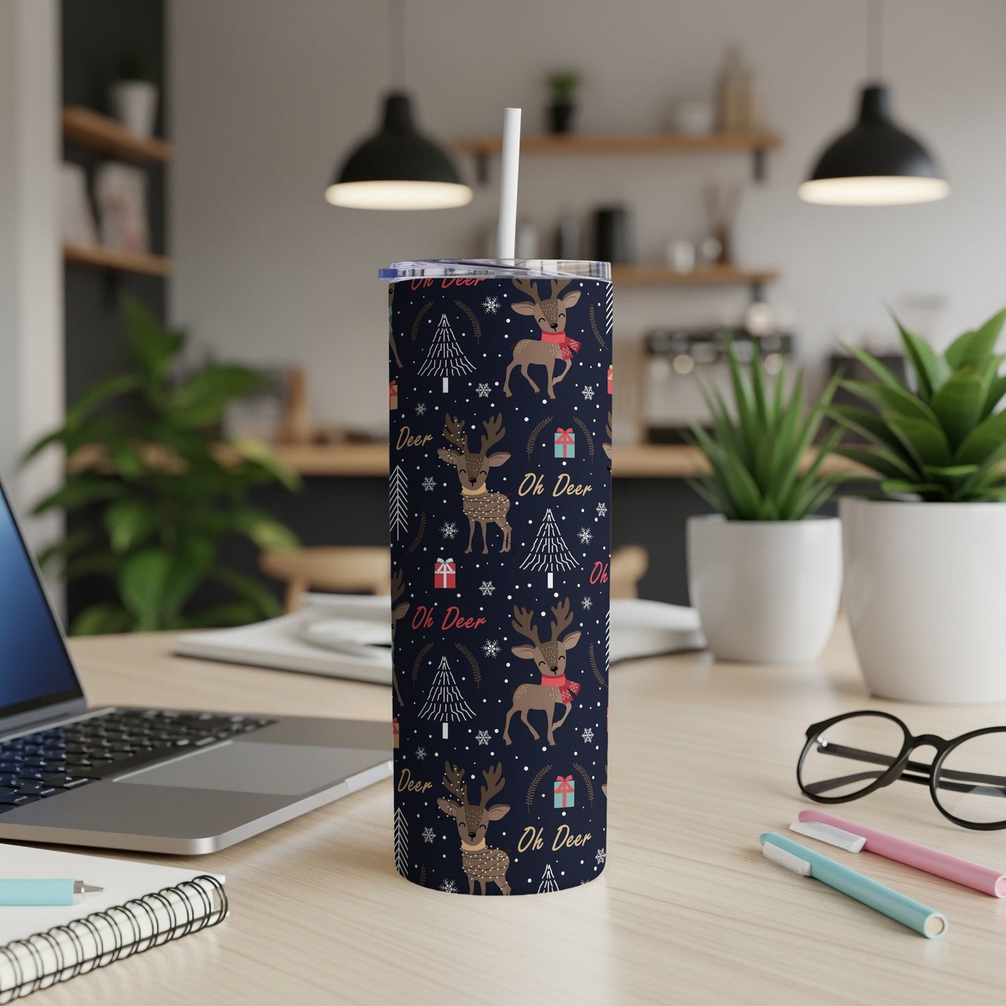 Navy blue tumbler with deer, snowflakes, and "Oh Deer" text.