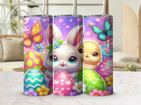 Easter-themed tumbler with a bunny, chick, butterflies, and decorated eggs.