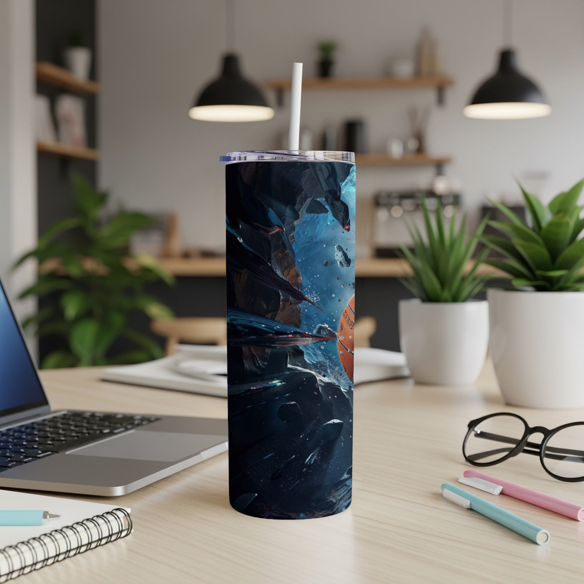 Tall tumbler with space-themed design and straw.