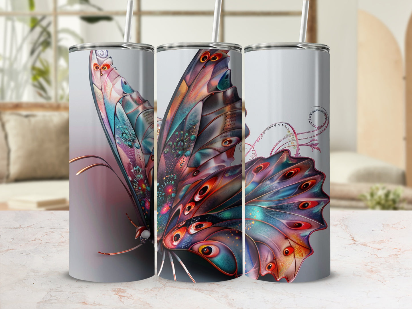 Three tumblers displaying a vibrant, detailed butterfly design.