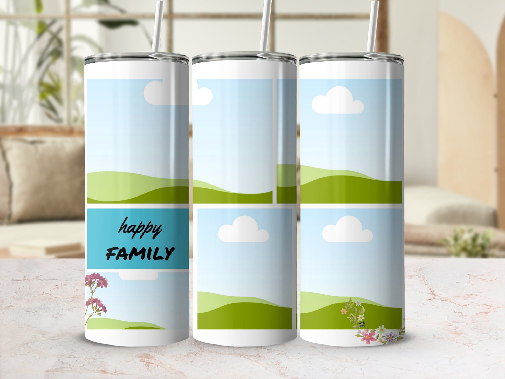 Three tumblers with a sky, rolling hills, and text "happy FAMILY."