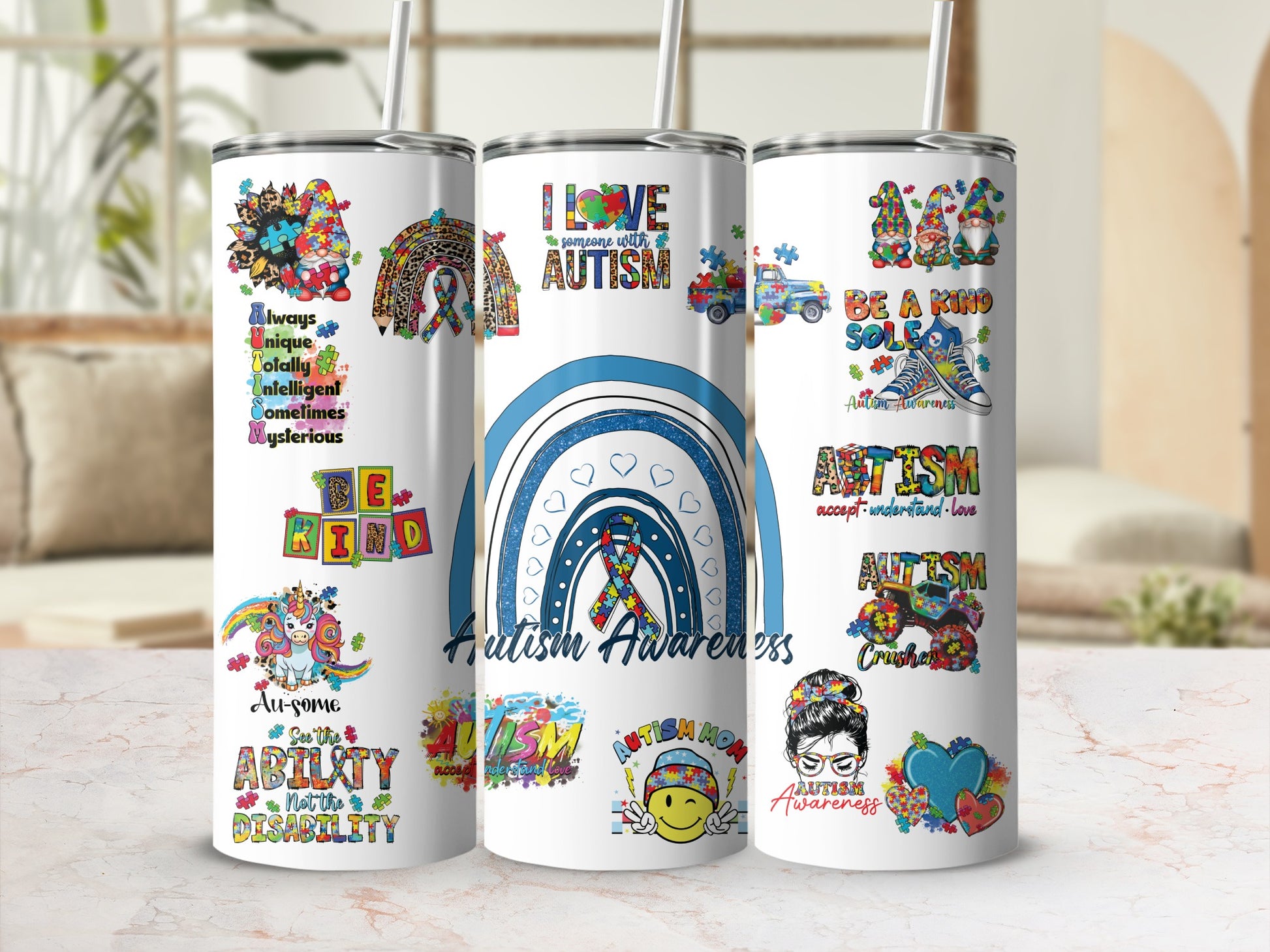 Three tumblers with various colorful designs and text about autism awareness.