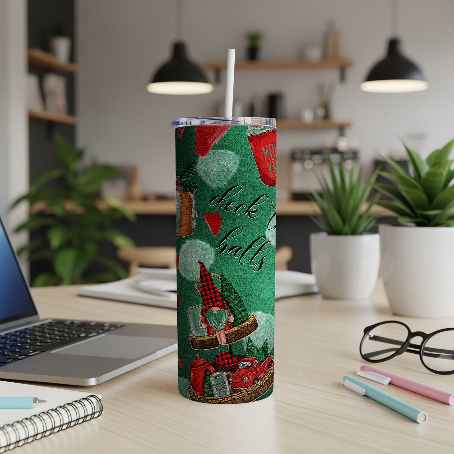 Green tumbler with gnome, gifts, and "Deck the Halls" text.