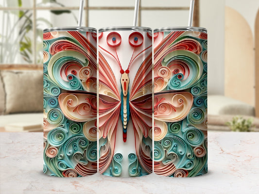 Three tumblers with a colorful butterfly design on a patterned background.