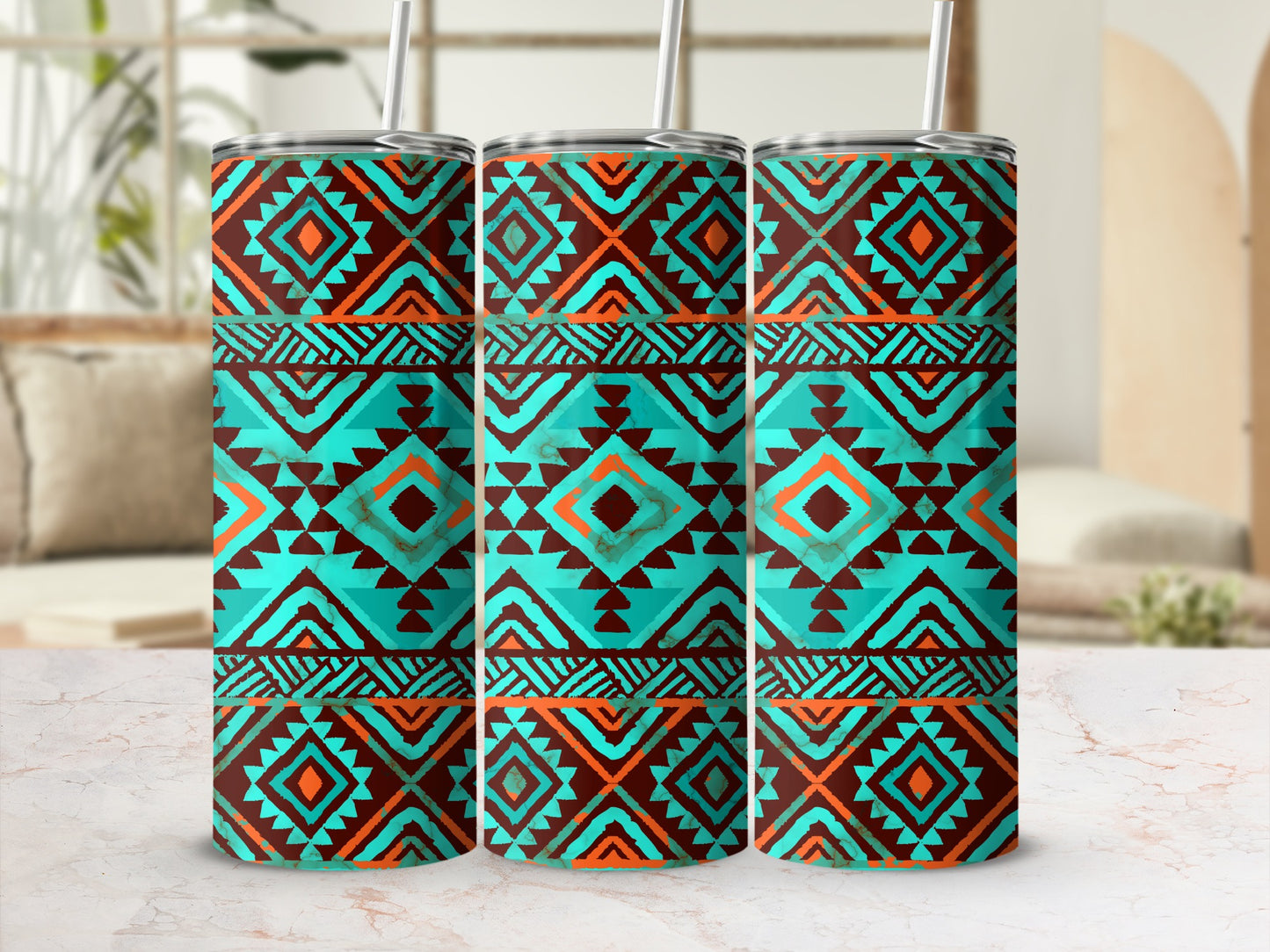 Three turquoise and orange geometric pattern tumblers with straws.