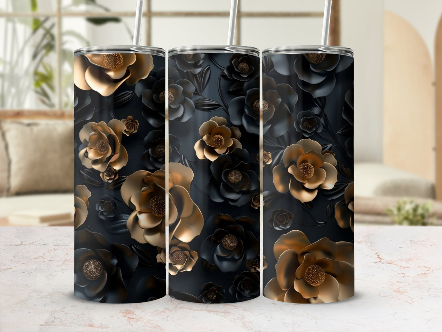 Three tumblers with dark floral designs and gold accents.
