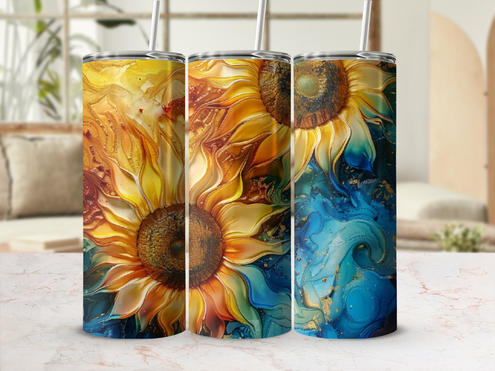 Three sunflowers with abstract golden and blue backgrounds on tumblers.