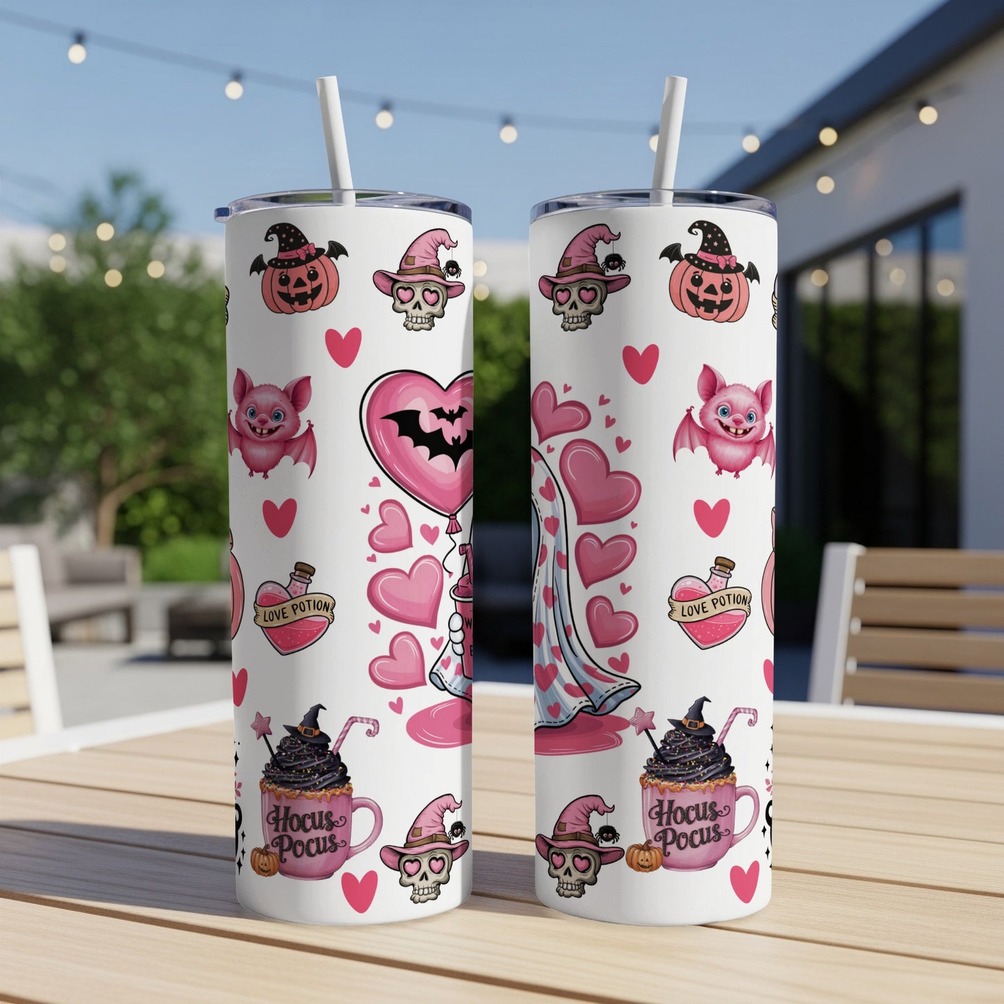 Two white tumblers with Halloween-themed cute illustrations and text.