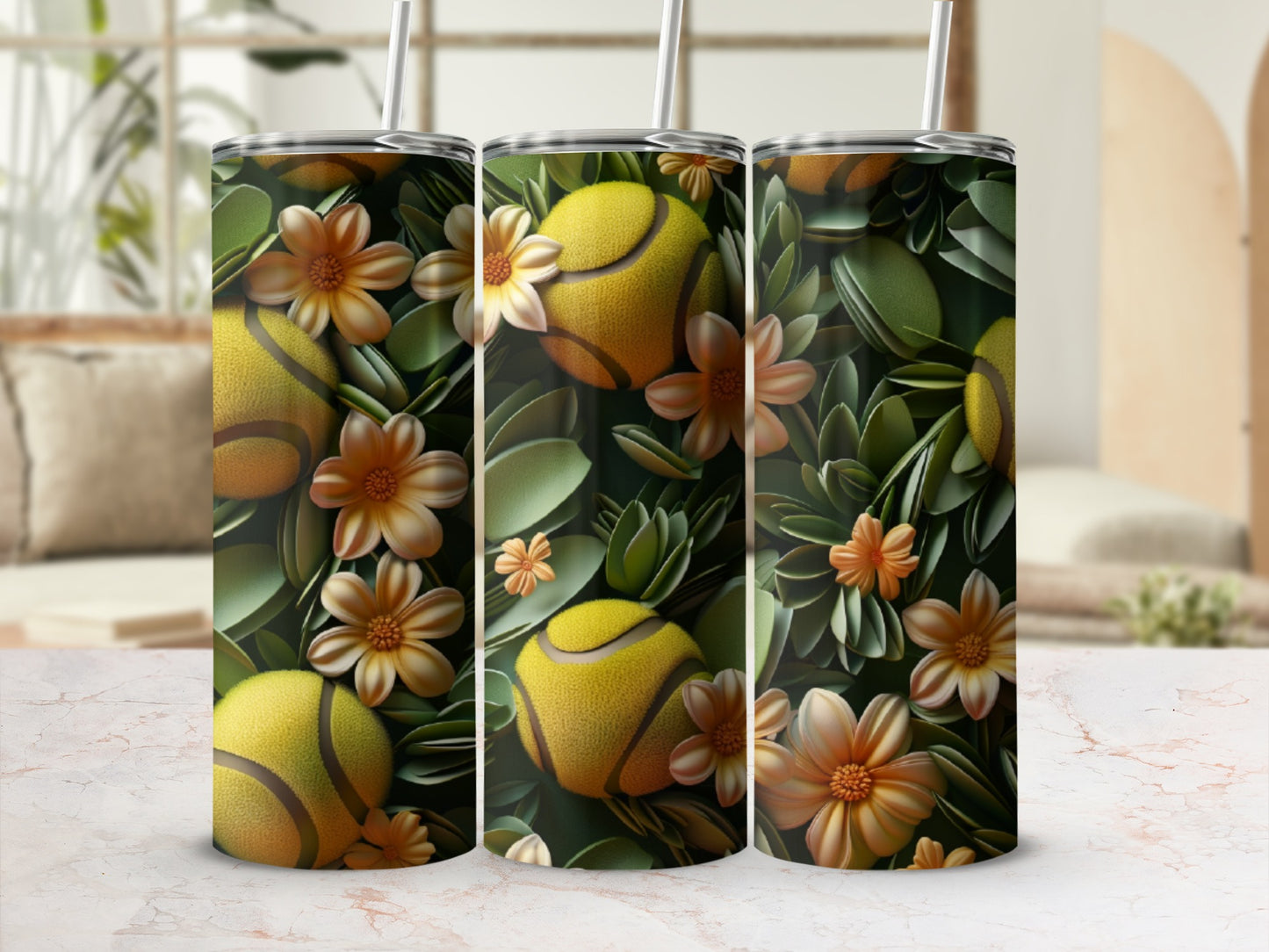 Three tumblers with tennis balls and floral pattern.