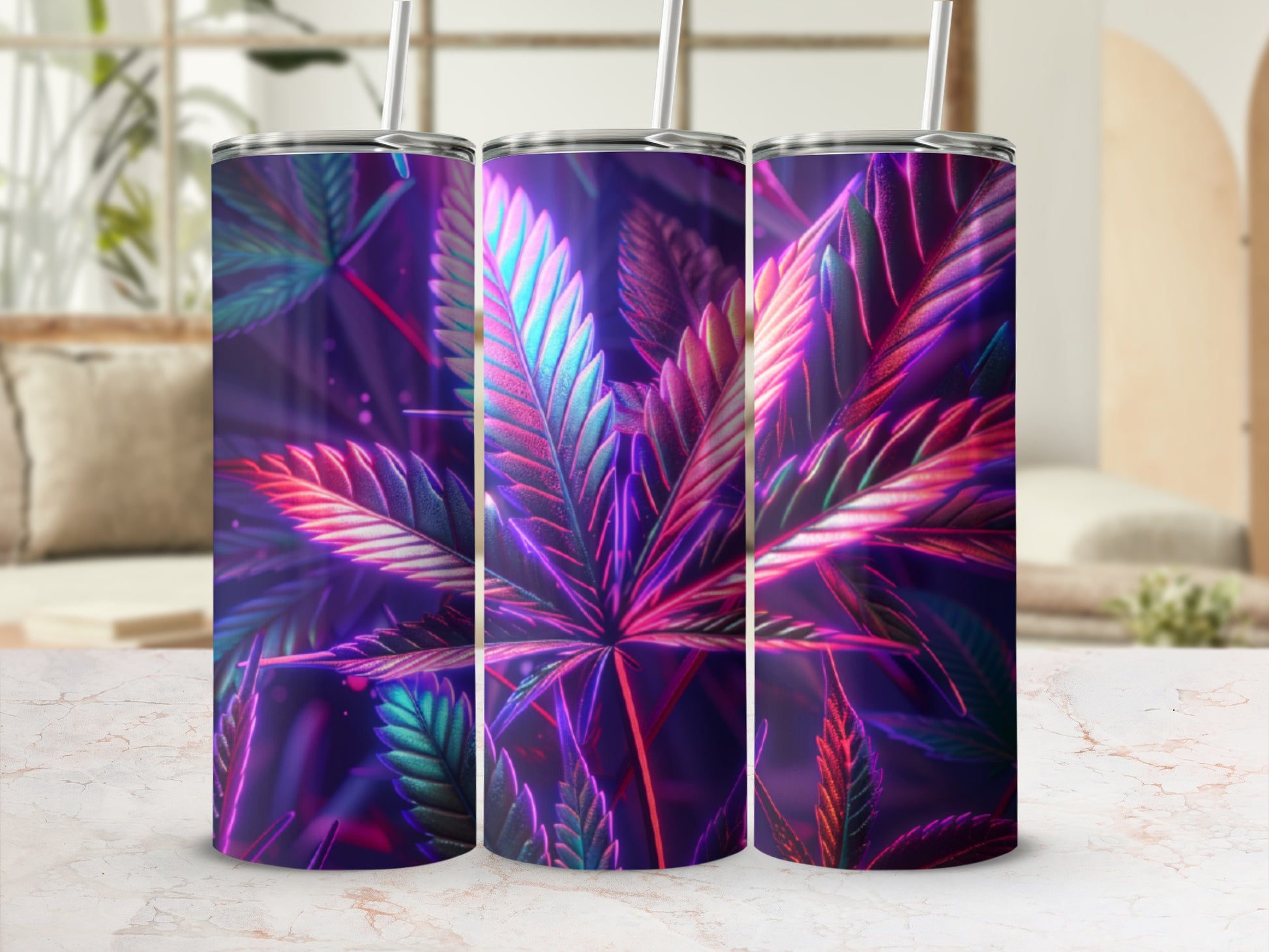 Three tumblers with iridescent cannabis leaf design on a patterned surface.